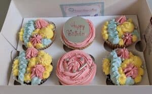 Happy birthday pink yellow and turqoise happy birtday with disccupcakes