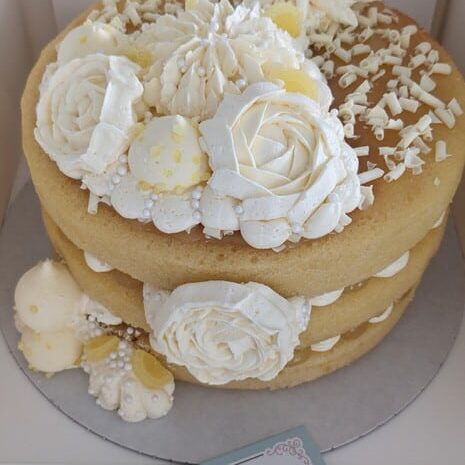 3 layer lemon sponge cake with sweet generations style floral vanilla buttercream decoration
